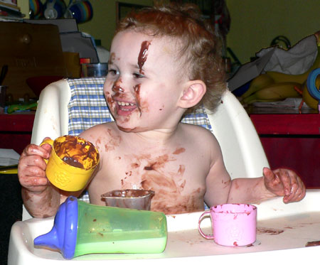 Sydney covered in chocolate pudding