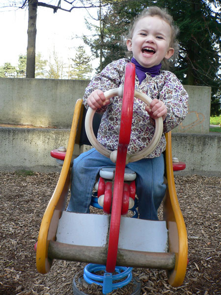 Sydney riding the... the... I don't really know what that thing she's riding is.