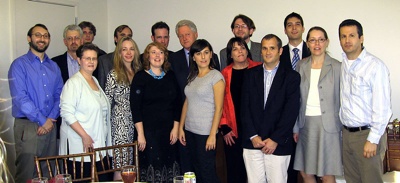 Bill Clinton poses with bloggers